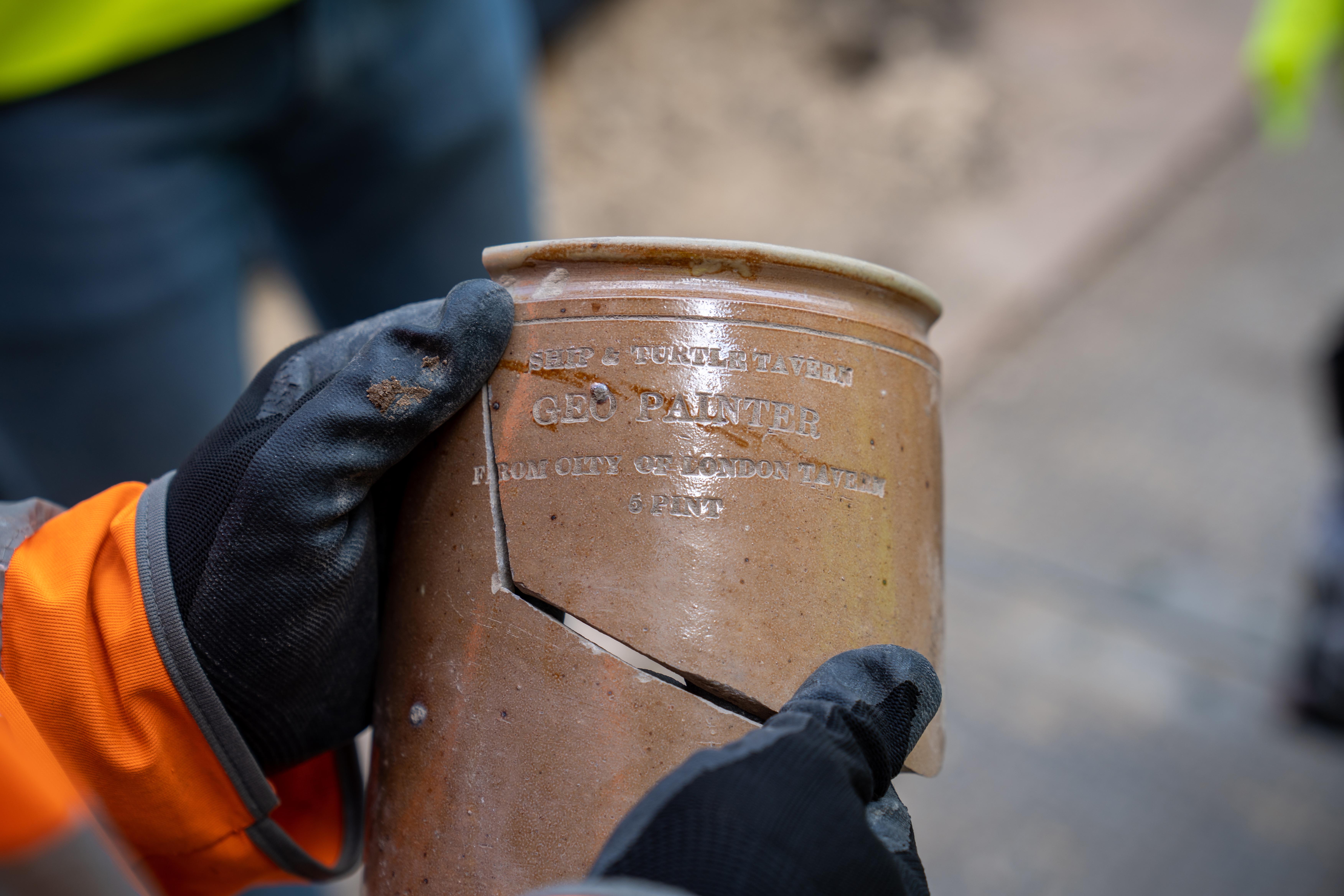 19th-century five-pint beer jug inscribed “Geo Painter”, linked to George Painter, tavern keeper of the historic Ship and Turtle Tavern in London’s Leadenhall area.